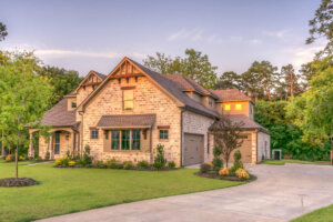 home sitting on a well manicured landscape